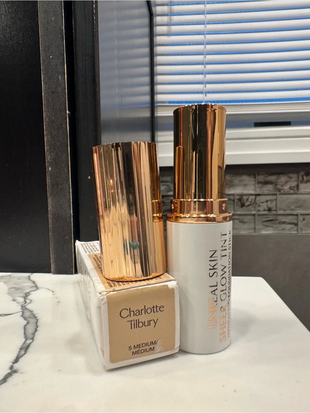 Charlotte Tilbury Unreal Skin Sheer Glow Tint Hydrating Foundation Stick – 5 Med
